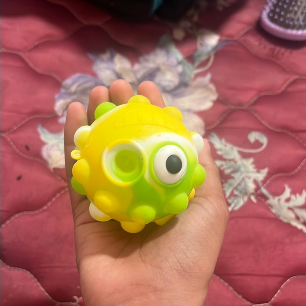 Yellow and Green Squeeze Toy